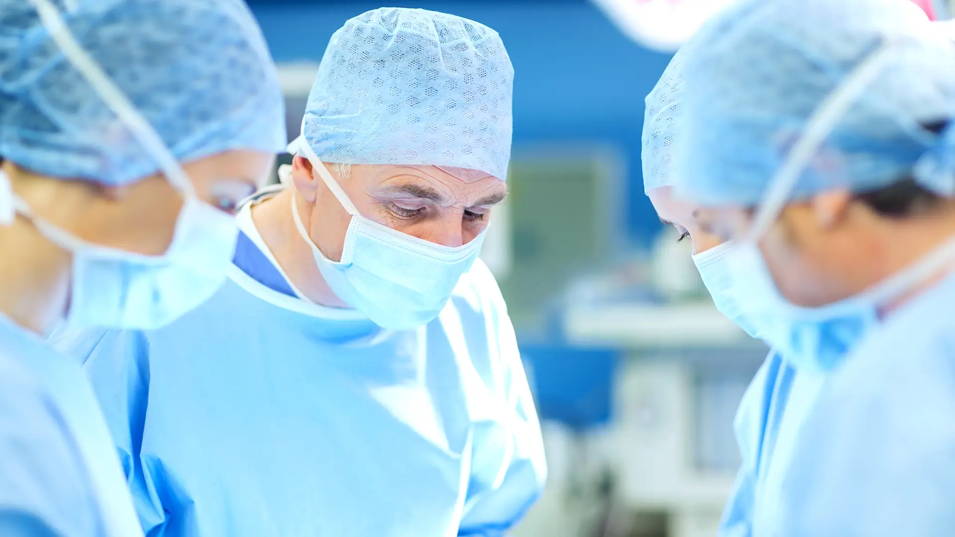 Surgeons operating