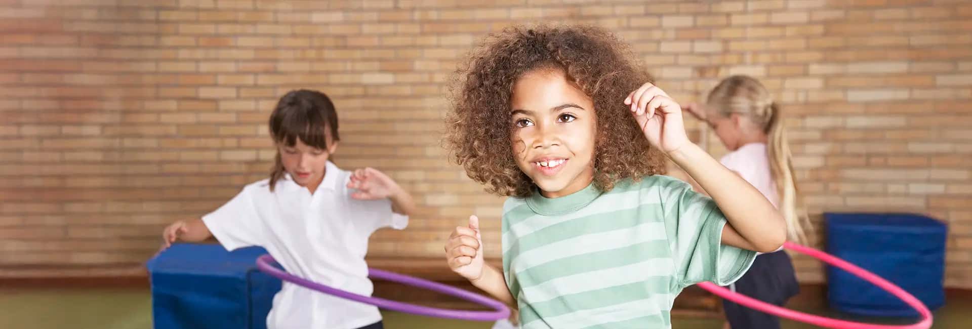 Girls hula hooping